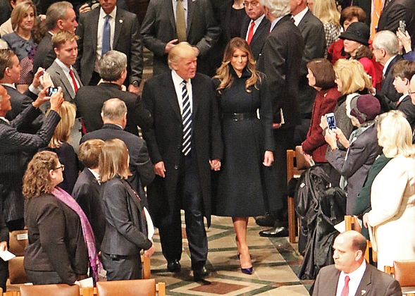 President Donald J. Trump and First Lady Melania Trump enter the Washington National Cathedral during the National Prayer Service, in Washington, D.C., Jan. 21, 2017. More than 5,000 military members from across all branches of the armed forces of the United States, including Reserve and National Guard components, provided ceremonial support and Defense Support of Civil Authorities during the inaugural period. (U.S. Army photo by U.S. Army Sgt. Paige Behringer)